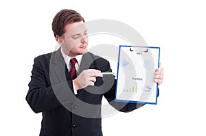 Accountant or financial manager showing charts and statistics