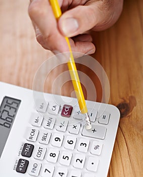 Accountant, hands and top view of calculator on table for asset management, financial planning or investment. Auditor