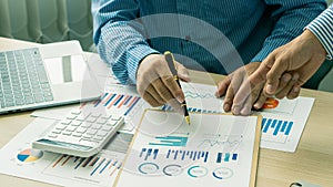 Accountant holding documents preparing performance analysis report Executives create documents