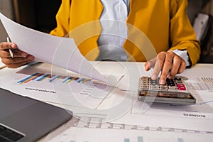 accountant  pointing on laptop for meeting team in office room. concept finance and accounting