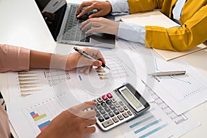 accountant  pointing on laptop for meeting team in office room. concept finance and accounting