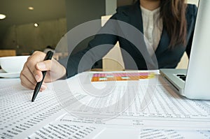 Accountant Working women with Spreadsheet document