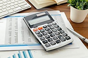 Accounting with calculator and computer keyboard