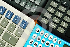 Accounting concept. Close up of calculators for financial calculations photo