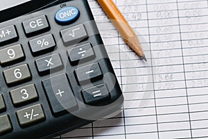 Accounting, financial concept, flat lay, calculator and pensil on wooden table