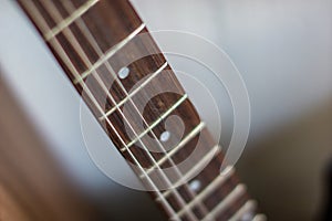 accoustic guitar strings with male hand playing