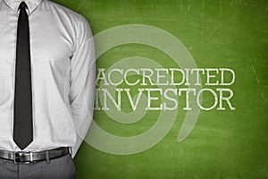 Accredited investor text on blackboard