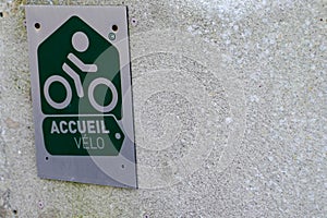 Accueil velo means in french bike cycle bikers welcome sign in hotel wall entrance photo