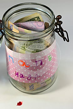 Accumulate money in a glass jar