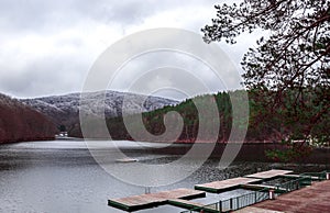 An accumulation lake during the winter  in a tourist area in southwestern Romania   background