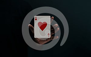Ace Heart Playing Card. Player or Magician Levitating Poker Card on Hand. Metaphor of Love, Happiness and begin a Good