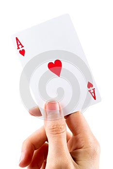 Ace of hearts being held over white