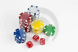 Ace playing cards with red dice. Poker chips on the white background