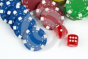 Ace playing cards with red dice. Poker chips on the white background