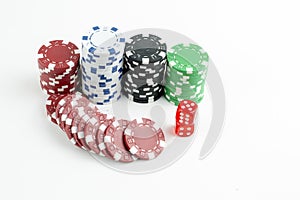 Ace playing cards with red dice. Poker chips on the white background