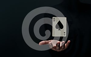 Ace Spade Playing Card. Levitating Poker Card on Hand. Front View photo