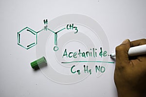 Acetanilide C8,H9,NO molecule written on the white board. Structural chemical formula. Education concept photo