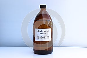 Acetic acid in bottle , chemical in the laboratory and industry