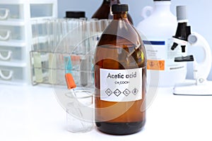 Acetic acid in bottle , chemical in the laboratory and industry