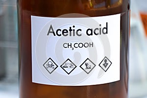 Acetic acid in bottle , chemical in the laboratory and industry