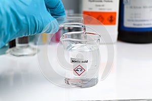 Acetic acid in glass, chemical in the laboratory