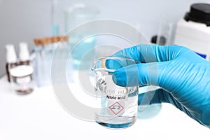 Acetic acid in glass, chemical in the laboratory