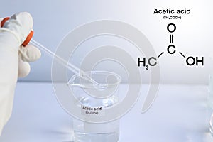 acetic acid in glass, chemical in the laboratory and industry