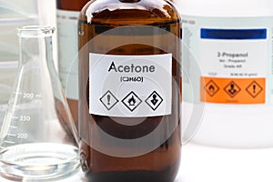 Acetone in bottle , chemical in the laboratory and industry