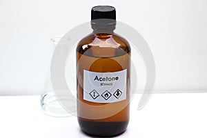 Acetone in bottle , chemical in the laboratory and industry