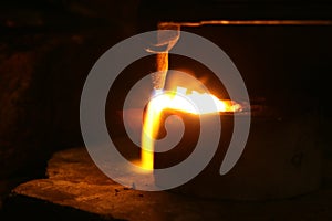 Acetylene torch smelting hot precious metals down