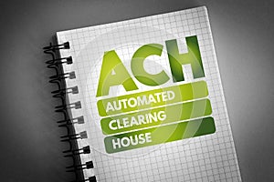 ACH - Automated Clearing House acronym on notepad, business concept background