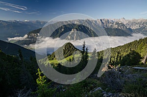 Achen lake covered by morning mist, The Brandenberg Alps, Austria, Europe photo