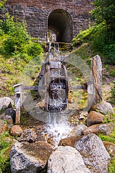 Old working wooden water wheel
