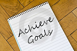 Achieve goals concept on notebook