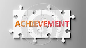 Achievement complex like a puzzle - pictured as word Achievement on a puzzle pieces to show that Achievement can be difficult and