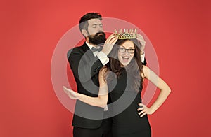 Achievement. Promotion and reward. Prom queen. Bearded man sexy girl. Royal party. Prom couple in formal style. Prom