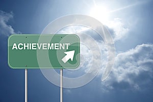 Achievement road sign