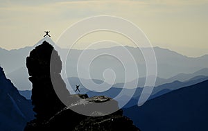 Climbers celebrating on mountain peak