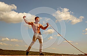 Achieving ambition in sport. Strong man pull rope. Sport man develop muscular hand strength. Athlete with fit torso