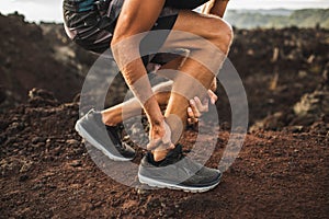 Achilles injury on running outdoors photo