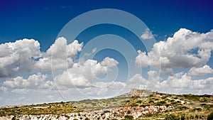 Cagliari the ancient fortress of Sant\' Ignazio in a cloudy blue sky photo