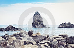 Acitrezza rocks of the Cyclops, sea stack in Catania, Sicily