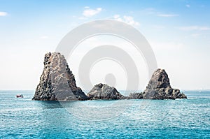 Acitrezza rocks of the Cyclops, sea stacks in Catania, Sicily, Italy