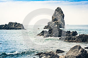 Acitrezza rocks of the Cyclops, sea stacks in Catania, Sicily, Italy