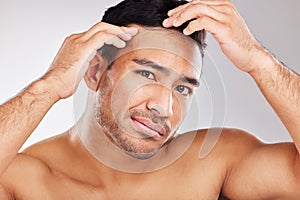 Acne, pimple and portrait of natural man in studio on white background for inspection or skincare. Beauty, blemish and photo