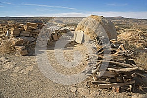 Acoma Pueblo Residents of historic Sky City, still use ancient adobe beehive oven and firewood for baking, cooking and making fi photo