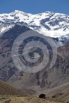 Aconcagua mountain peak with clear blue sky. Argentina