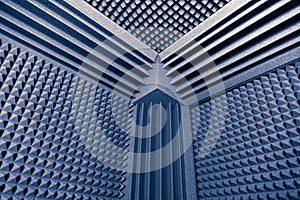 Acoustic foam absorber and bass traps for sound dampering blue background