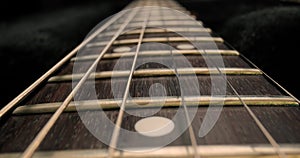 Acoustic guitar detail, fretboard closeup
