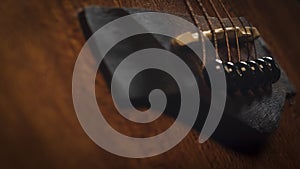 Acoustic guitar fret board on blur background
